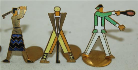 Eight German / Austrian Art Deco brass and enamel sports people menu holders, 3.8cm - 4cm